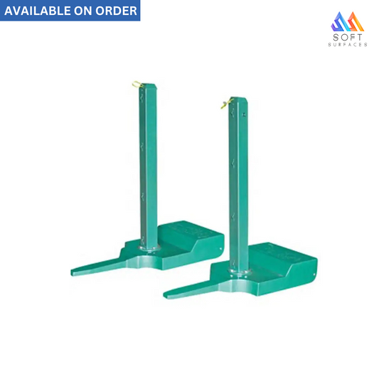 Two green portable tennis posts with a visible brand logo, designed for setting up a tennis net on a court.